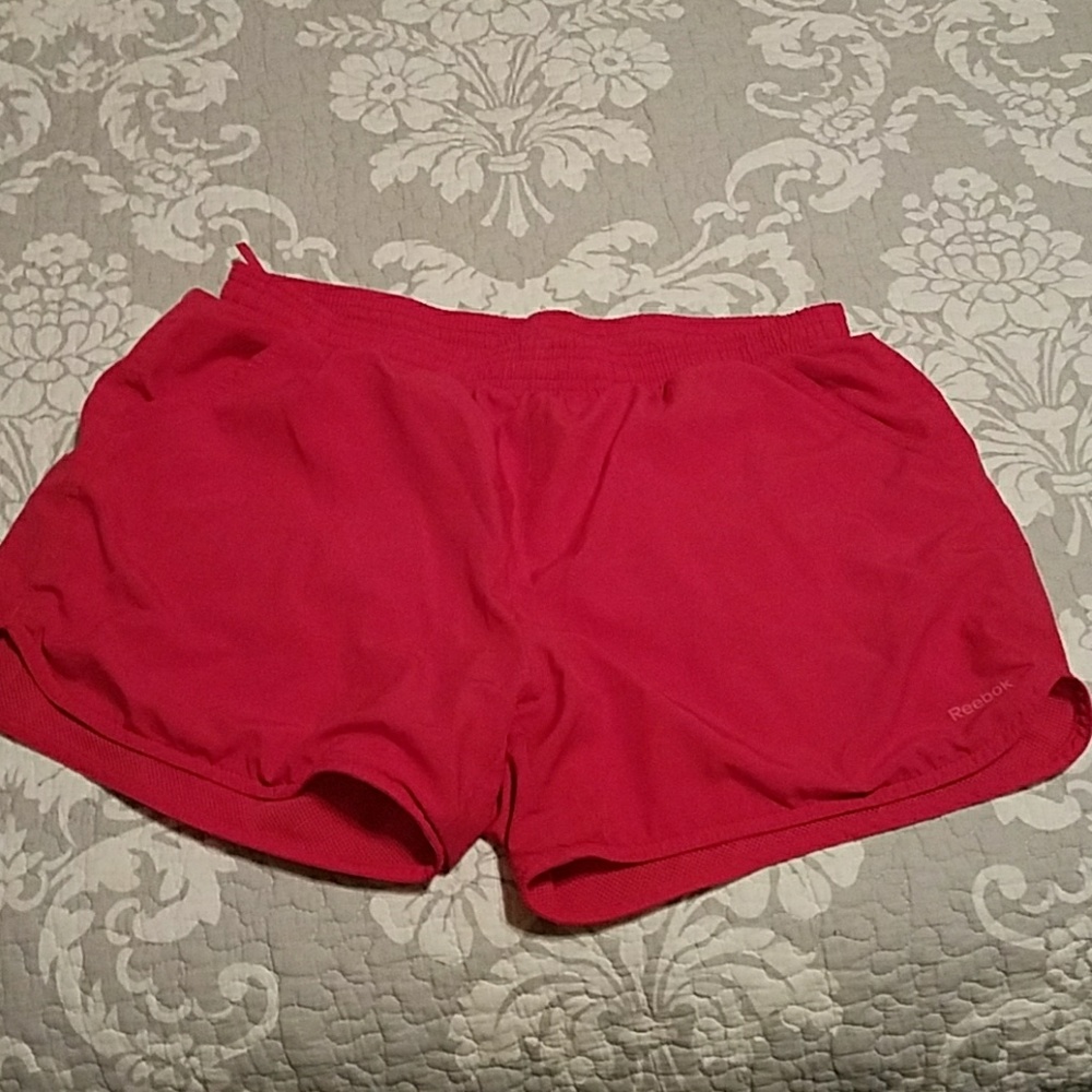 Hot pink Reebok shorts